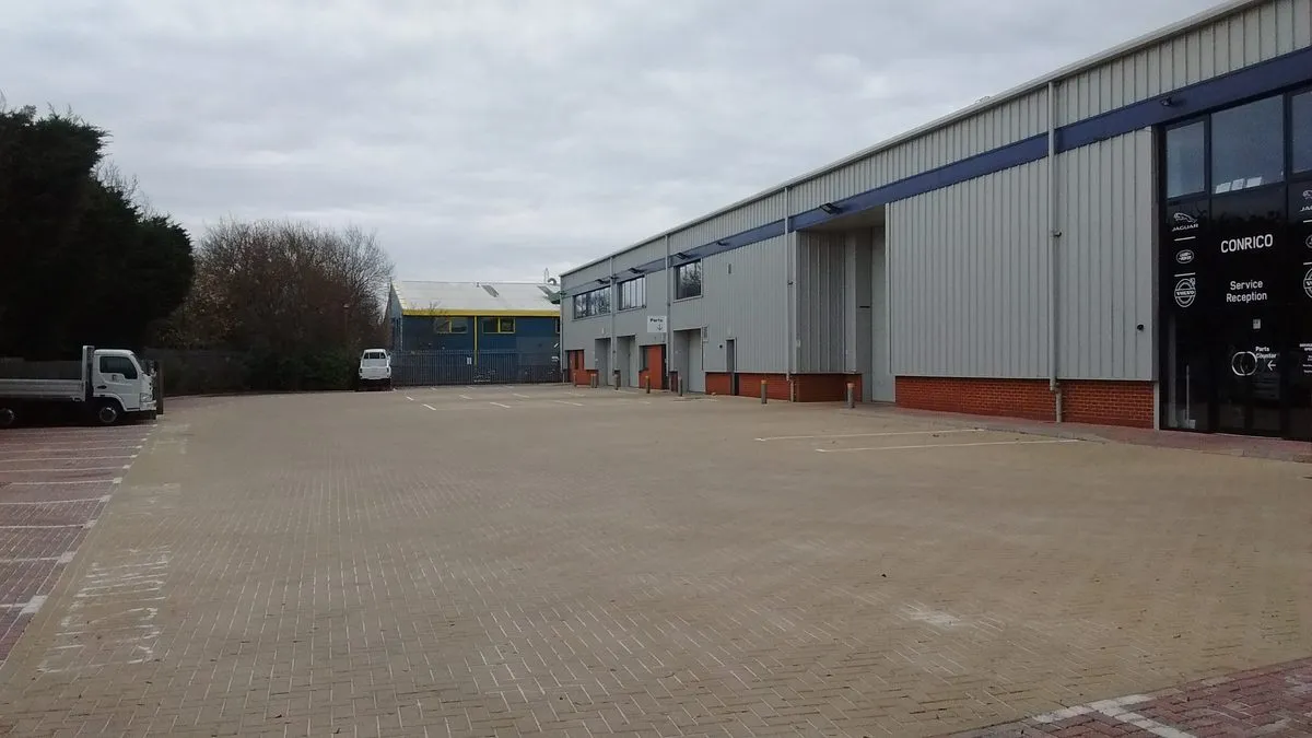 Block paving pressure washed clean at a Surrey car park, the same jet wash we use on driveways and patios